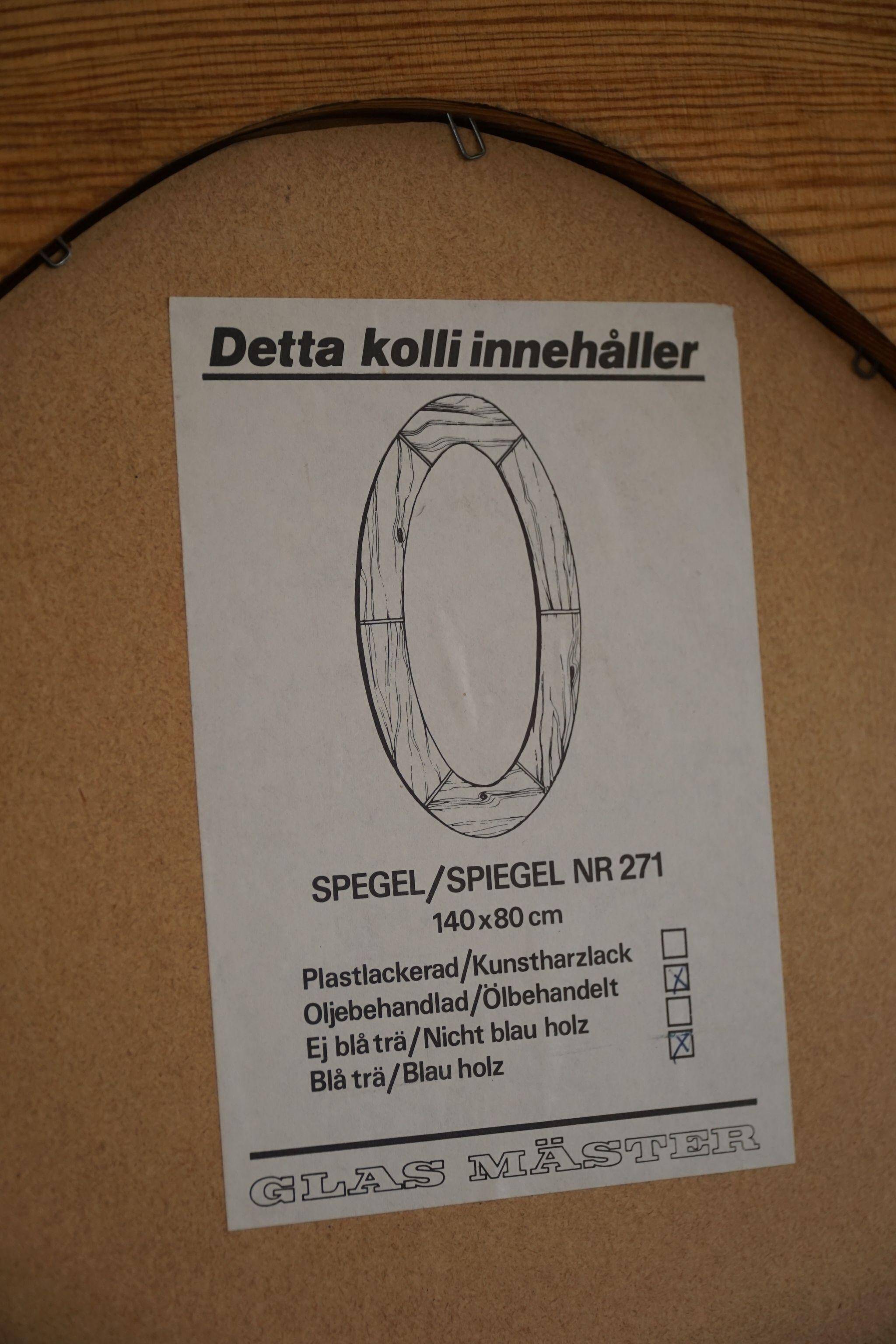 Large oval wall mirror in solid pine by Glasmäster Markaryd, Sweden, 1960s.