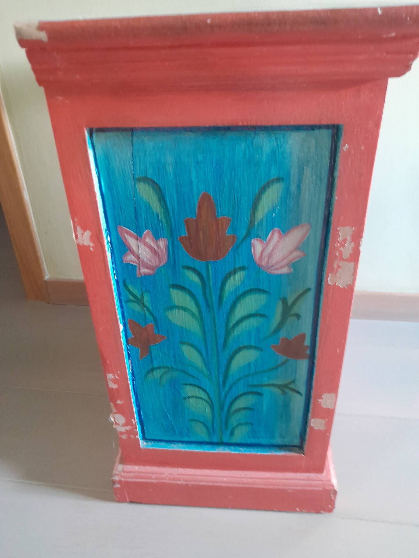 Painted wooden piece of furniture
