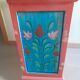 Painted wooden piece of furniture