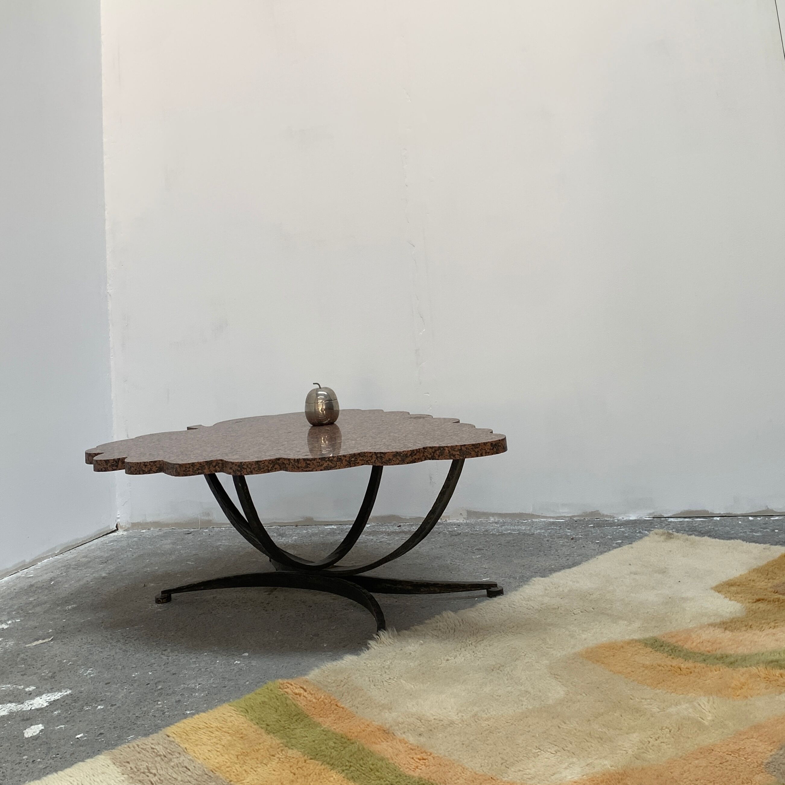 Granite and hammered wrought iron coffee table