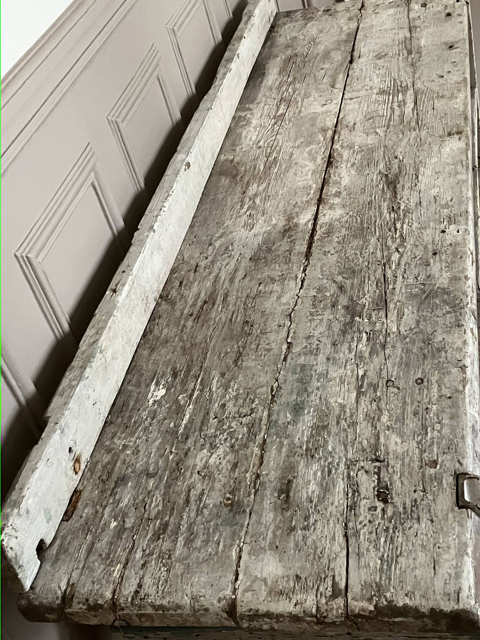 Old workbench, a piece of wooden and metal furniture.