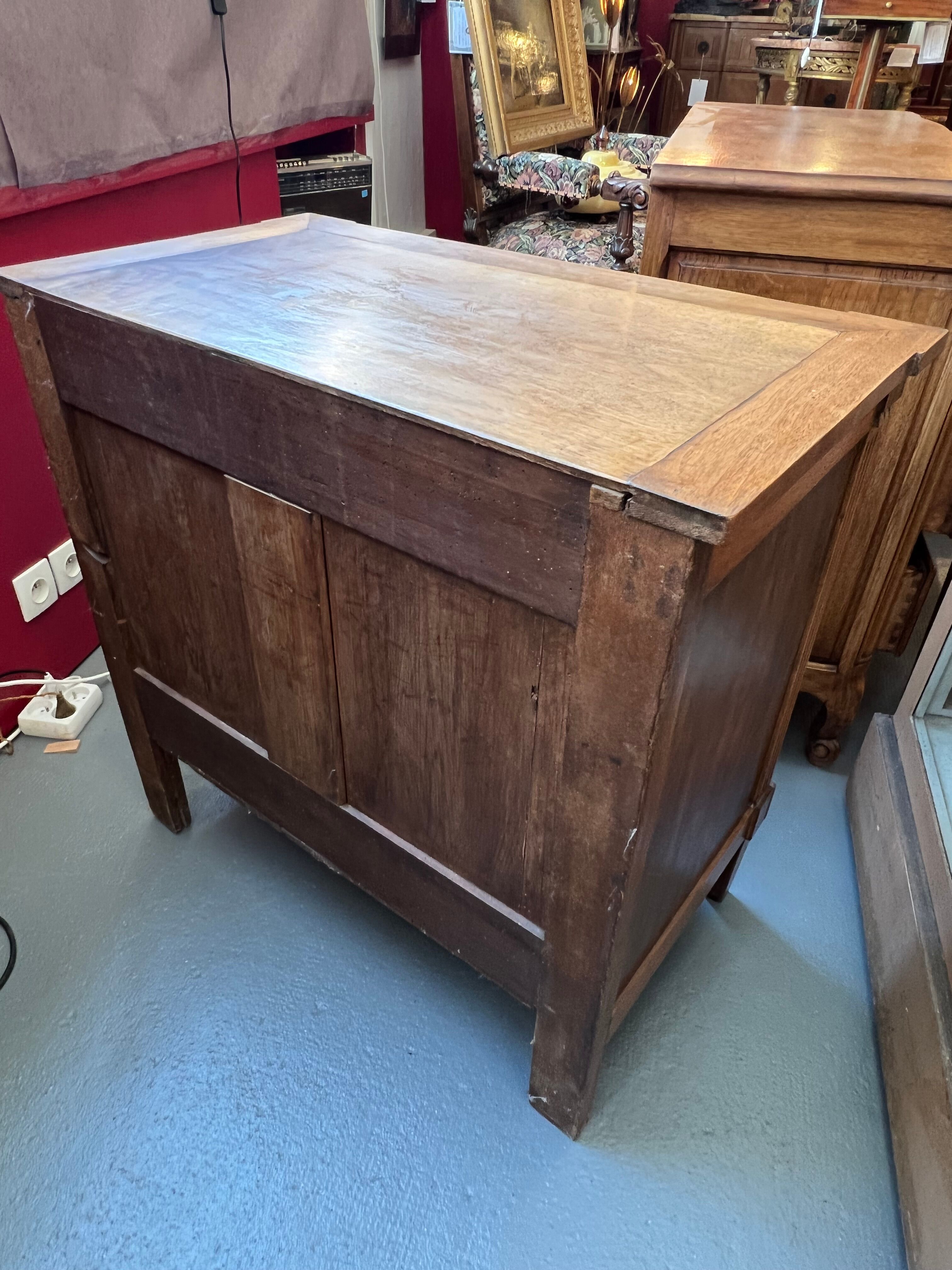 Chest of drawers louis XVI style, early twentieth in solid walnut