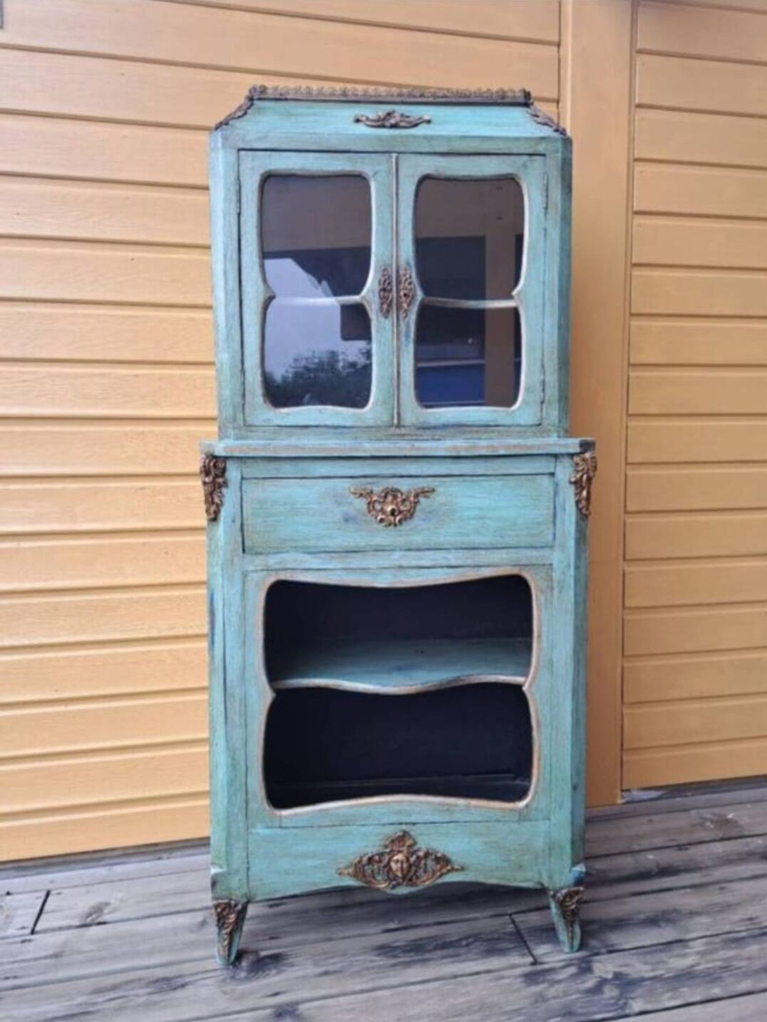 Blue patinated wooden display cabinet