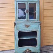 Blue patinated wooden display cabinet