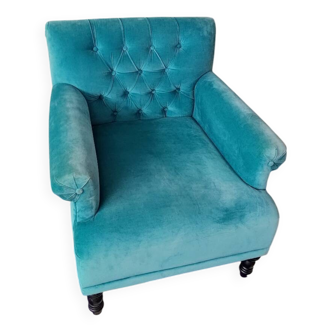 Fauteuil capitonné stylé Chesterfield