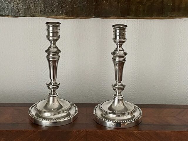Pair of Christofle silver metal candle holders.