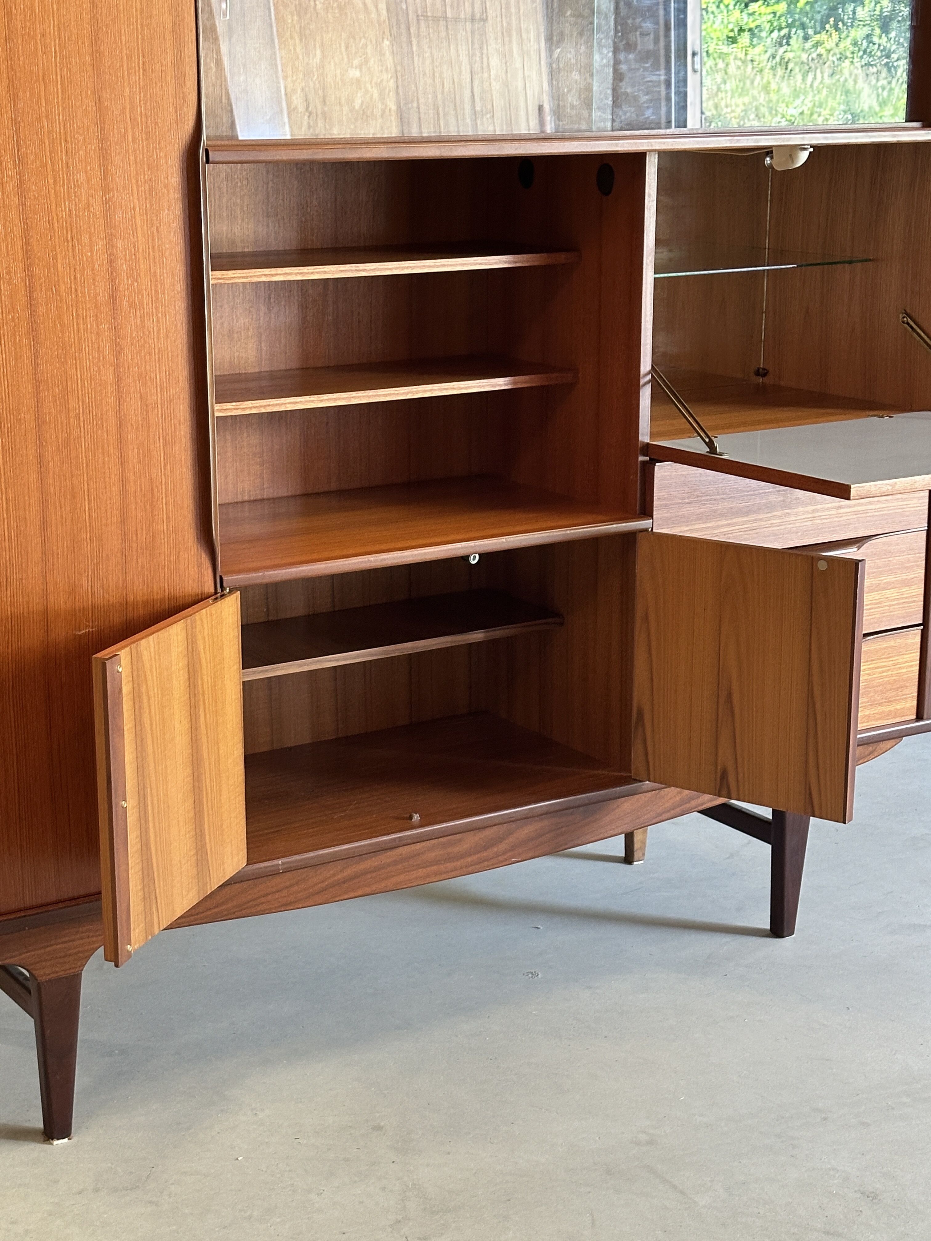 Very beautiful Scandinavian highboard in teak from the 1960s.