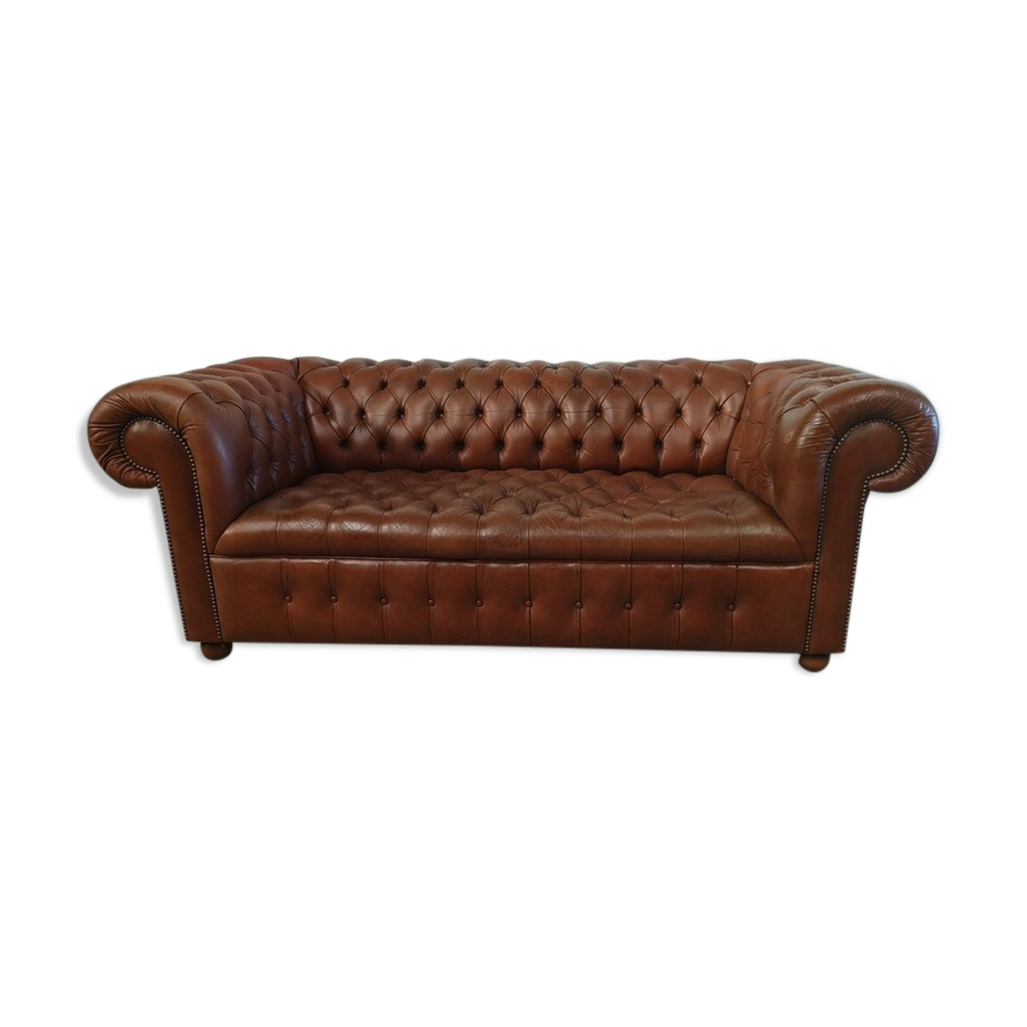 Light brown leather chesterfield sofa