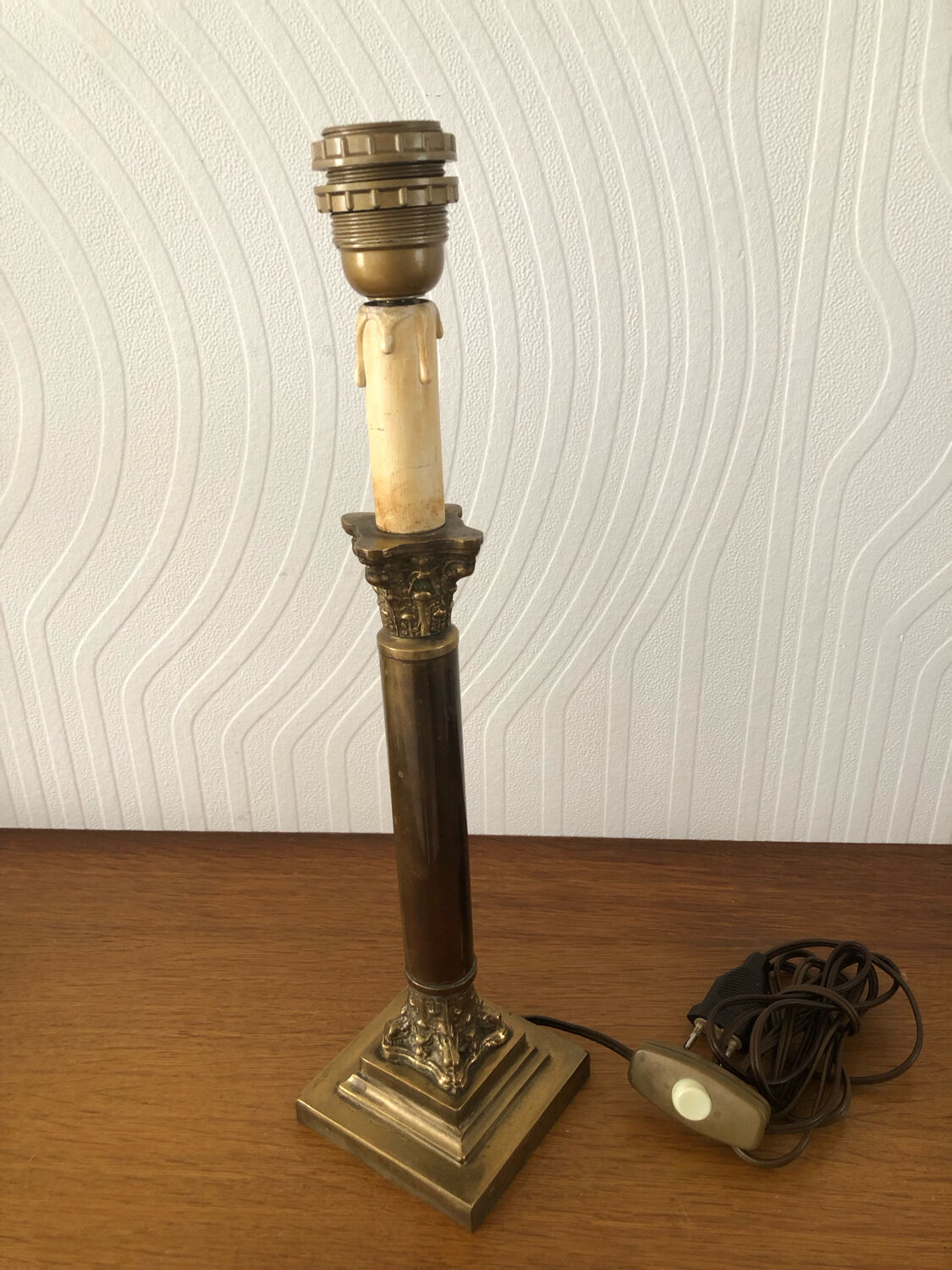 Ancient lamp foot candlestick corinthian column in bronze