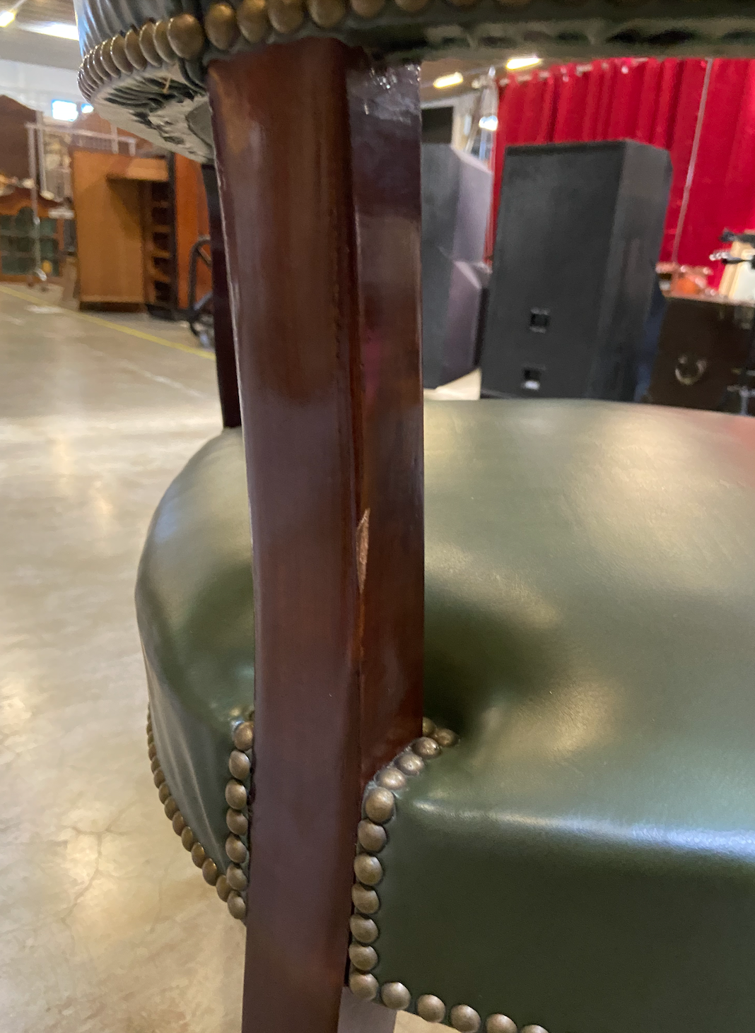 Empire style office armchair in green leather