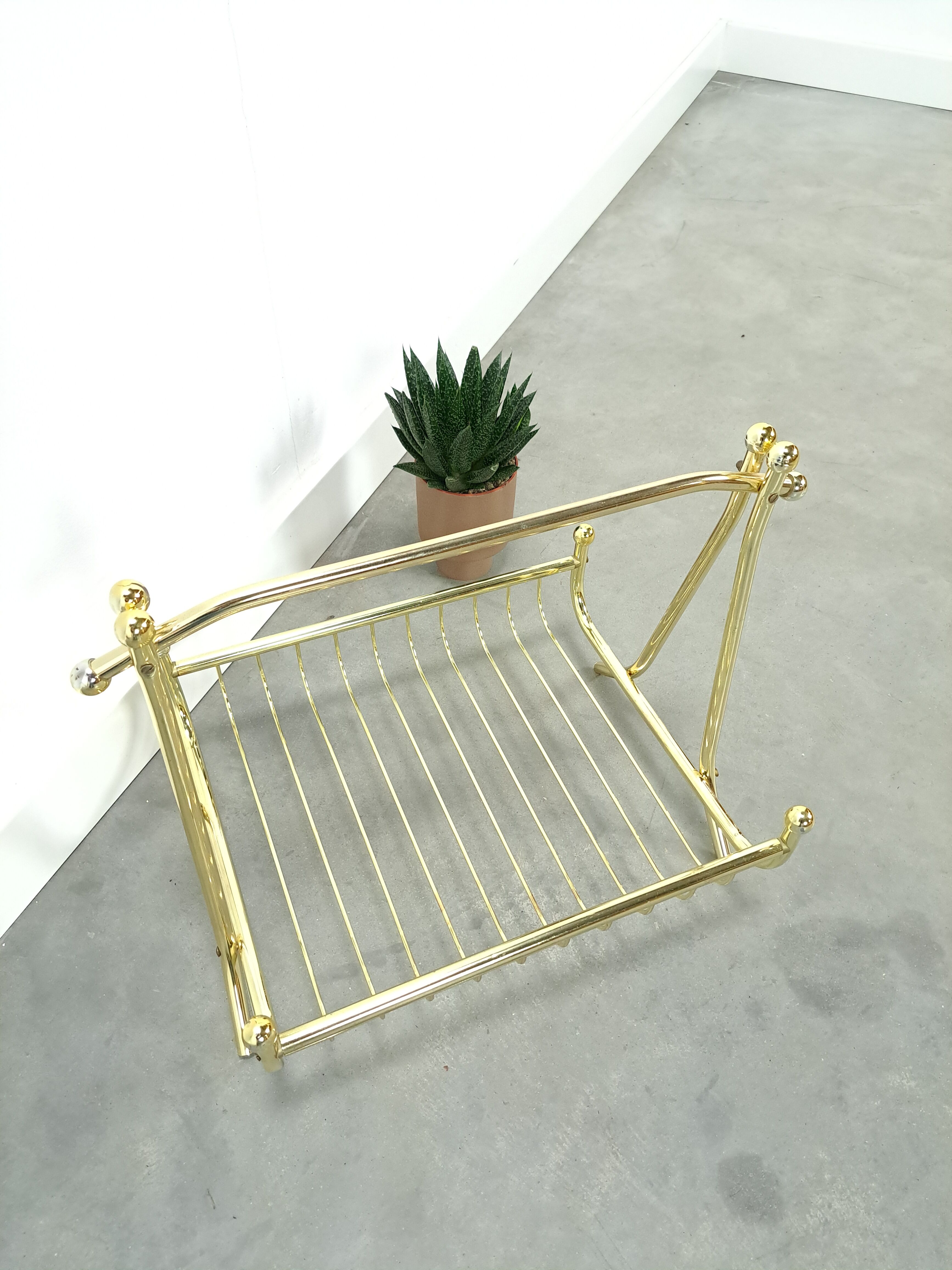 Gold magazine rack