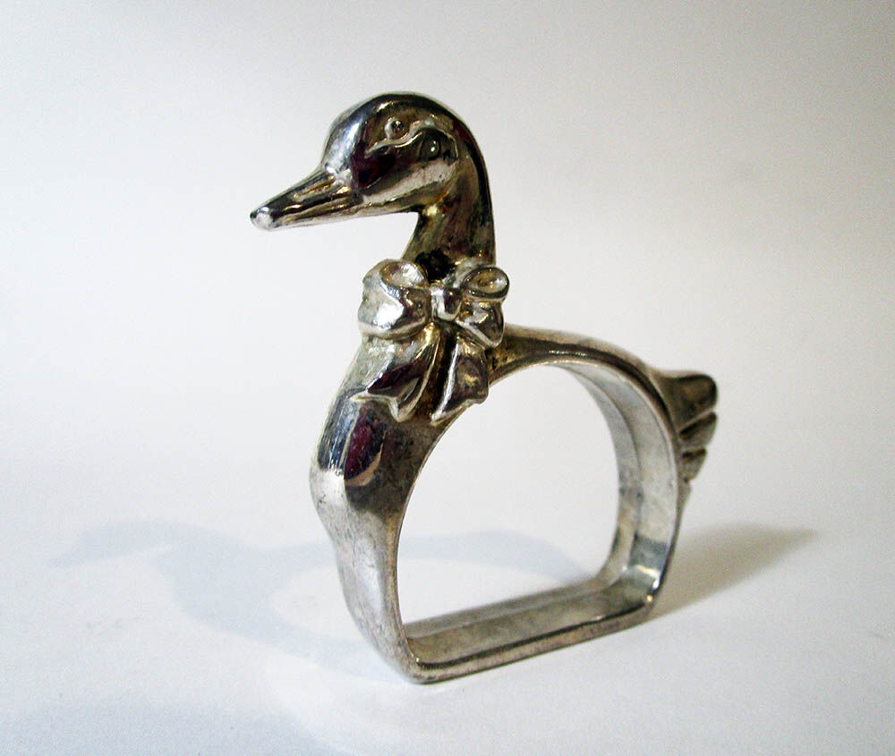 Paper towel holder with swans