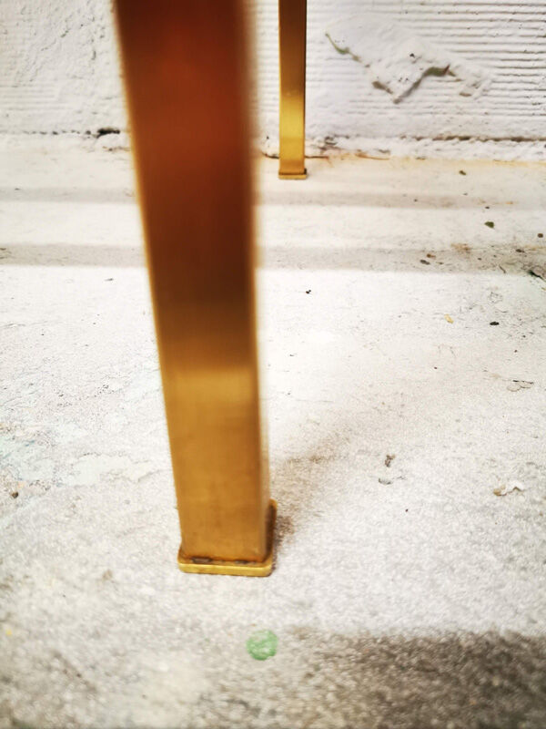 Golden metal side table