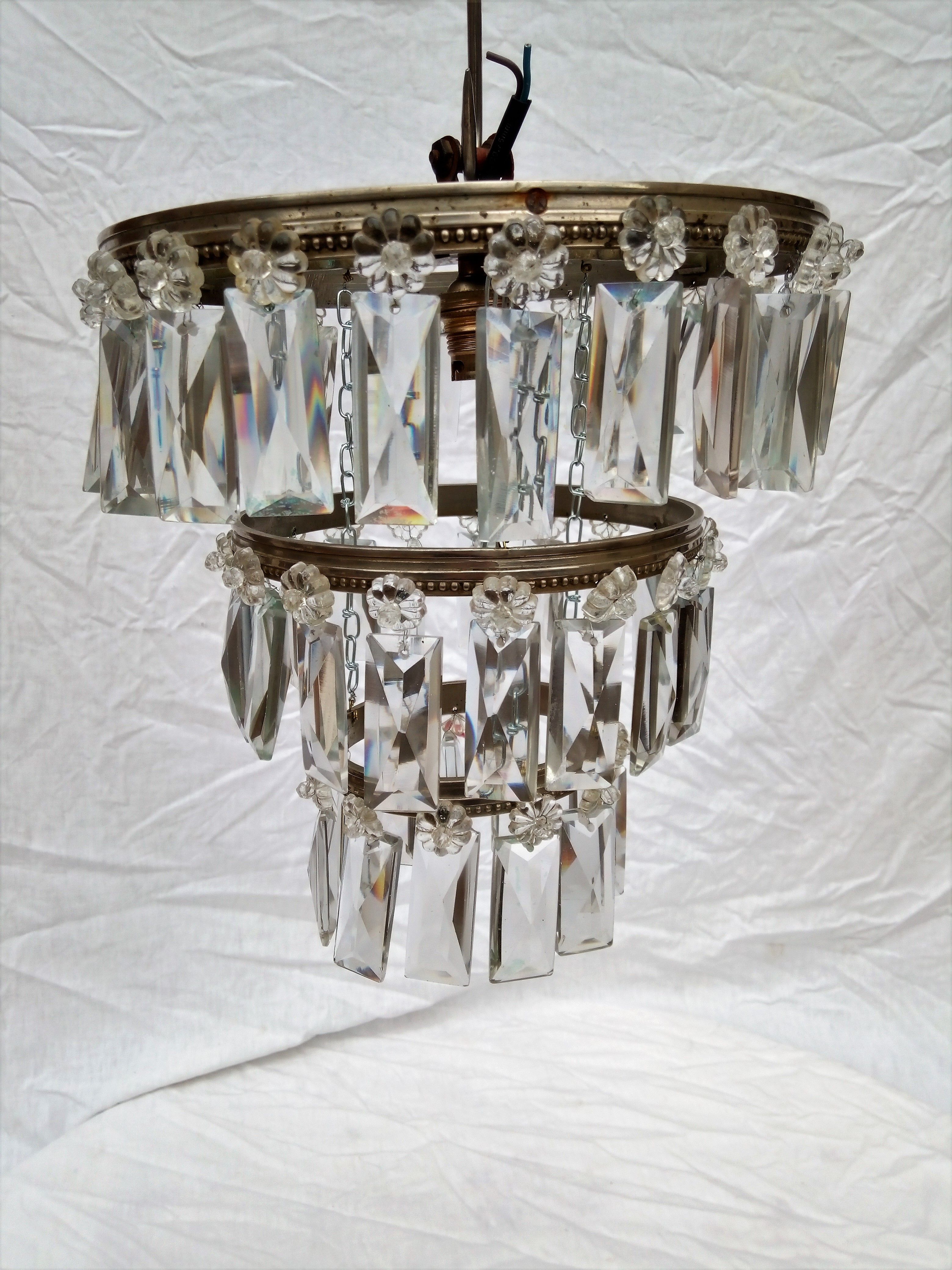 Ancient chandelier, bronze ceiling and stamps, 1900s
