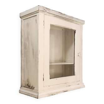 Glazed wall-mounted medicine cabinet in patinated wood