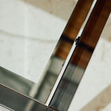 Chrome and glass coffee table.