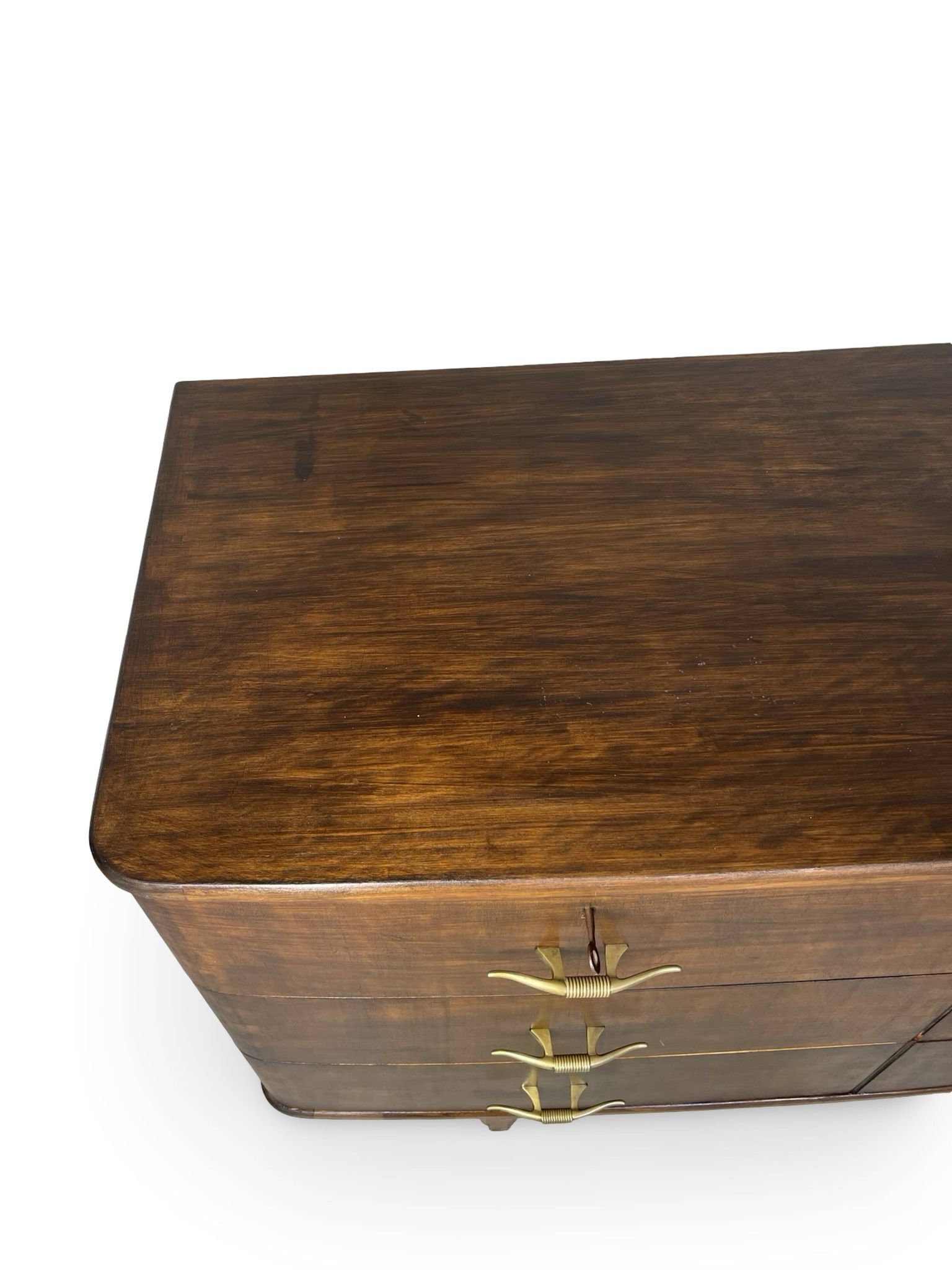 A vintage Italian chest of drawers, made of veneered walnut and solid wood,