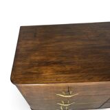 A vintage Italian chest of drawers, made of veneered walnut and solid wood,