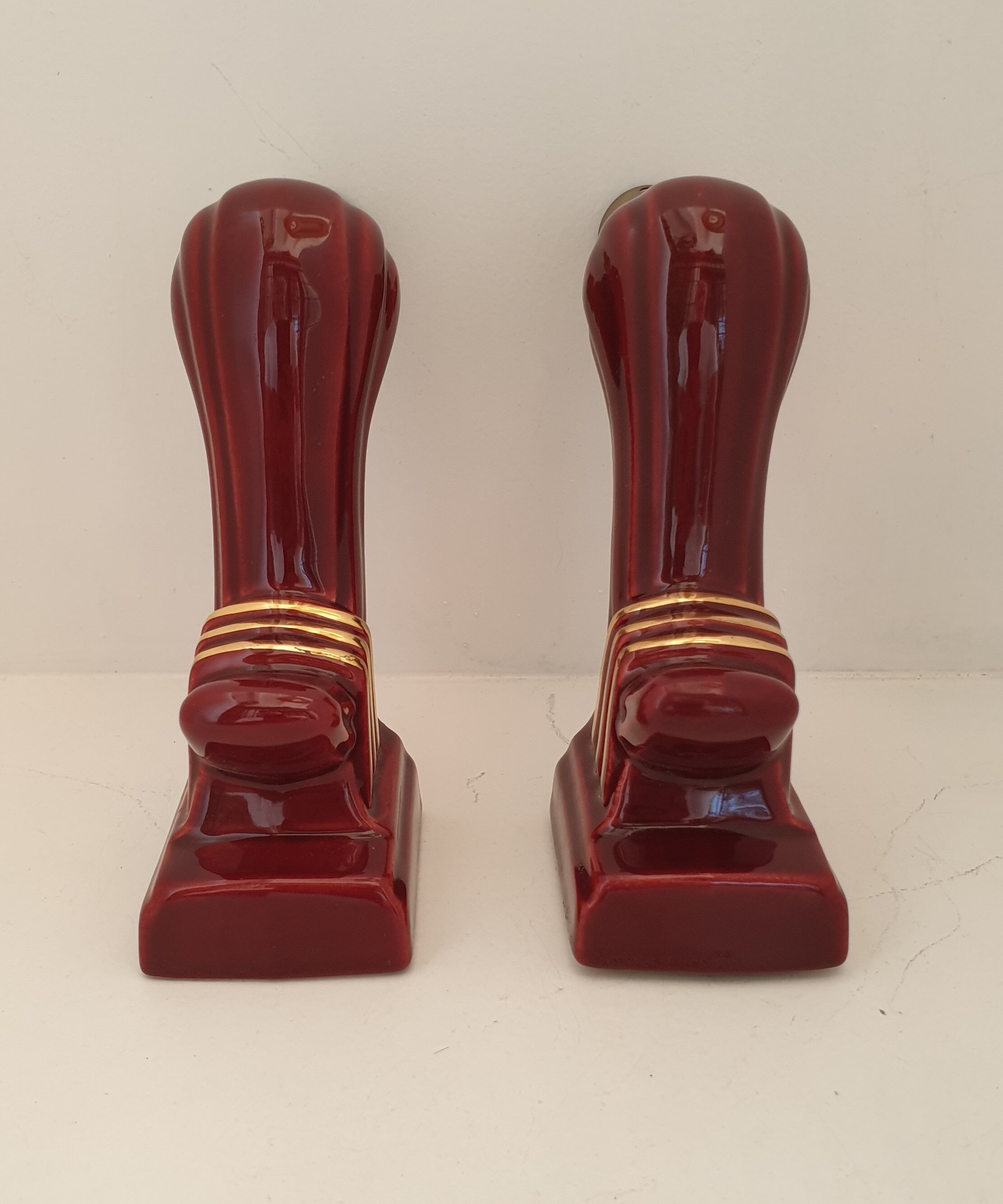 Pair of art deco sconces in bordeaux and gold ceramics