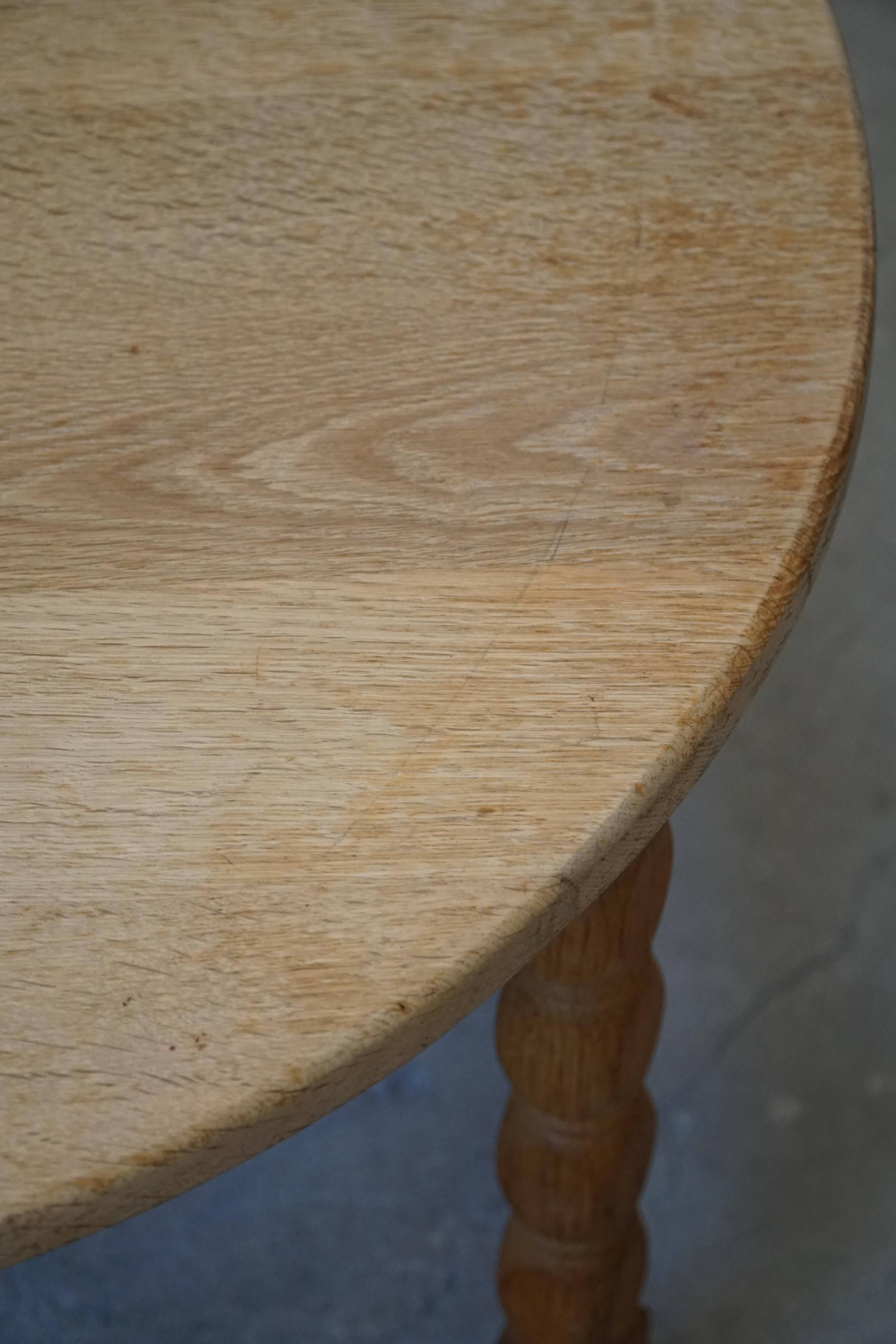 Round modern Danish brutalist coffee table/sofa in solid oak, 1960s.