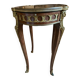 Living room table in Louis XV-Louis XVI transitional style with marquetry and bronze.
