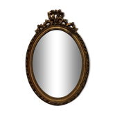 Miroir ovale en bois doré 52 x 35 cm