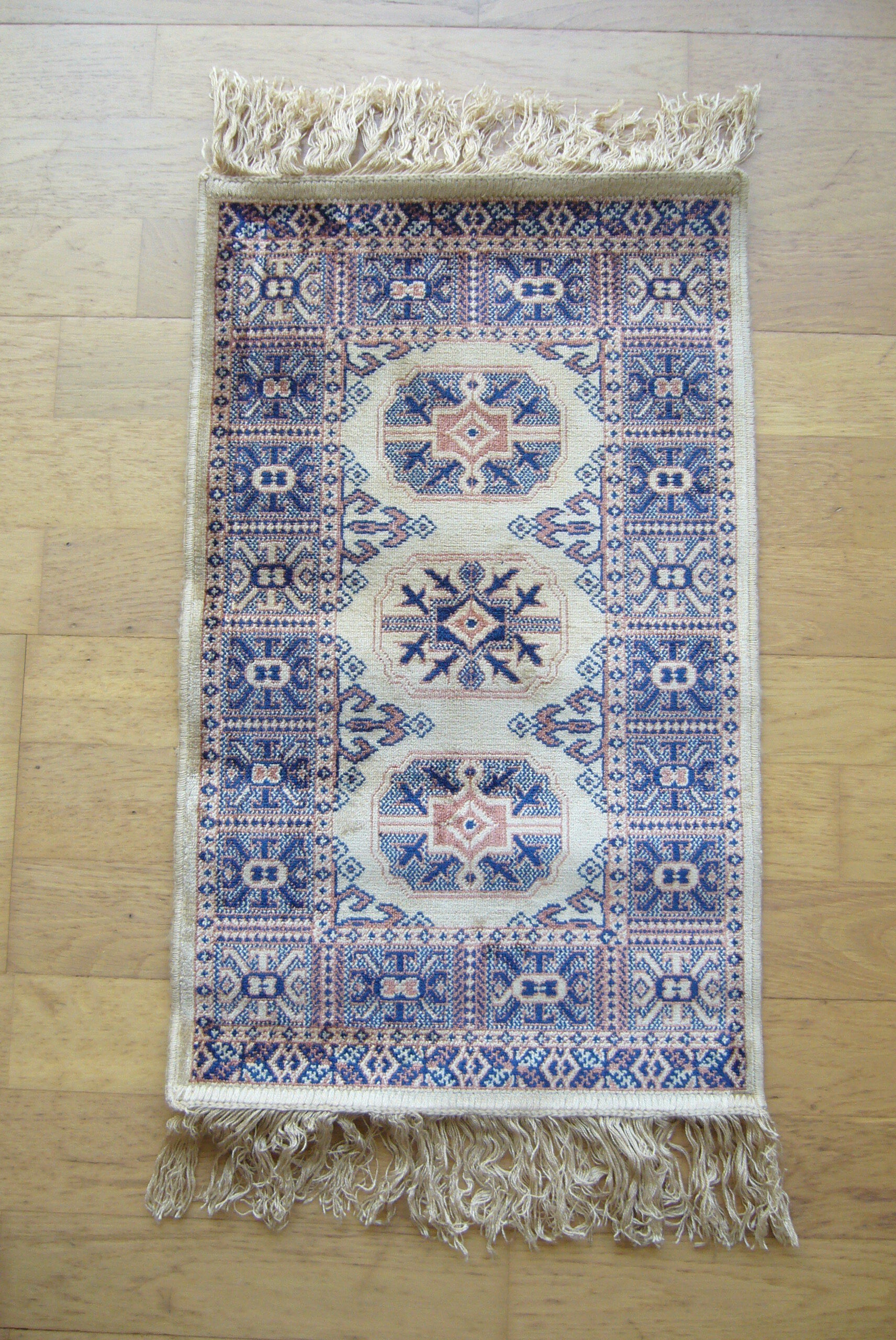 Three oriental rugs 35 x 70 cm