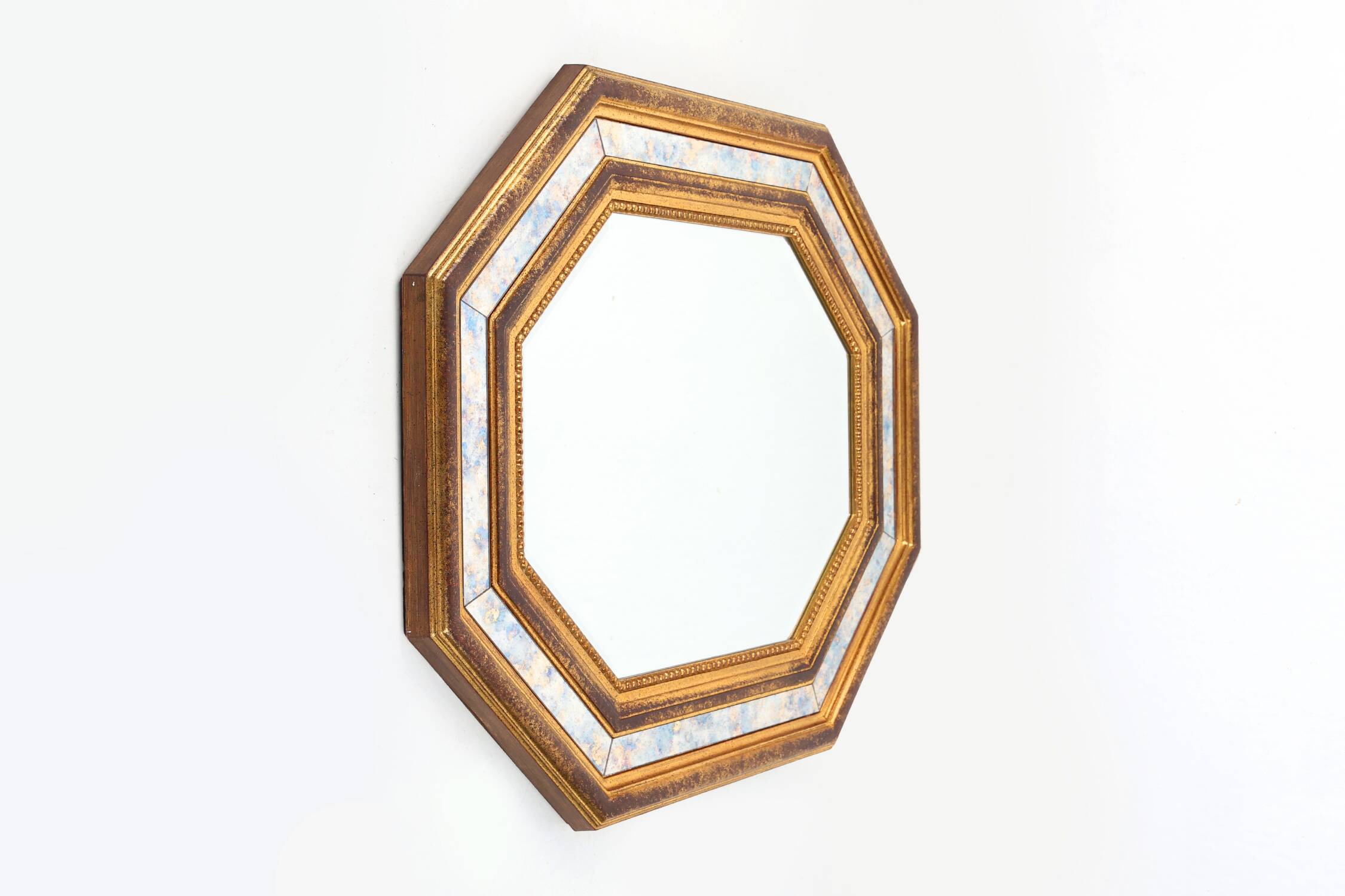 Gilded octagonal mirror by Deknudt Belgium decorated with smoked mirror gla