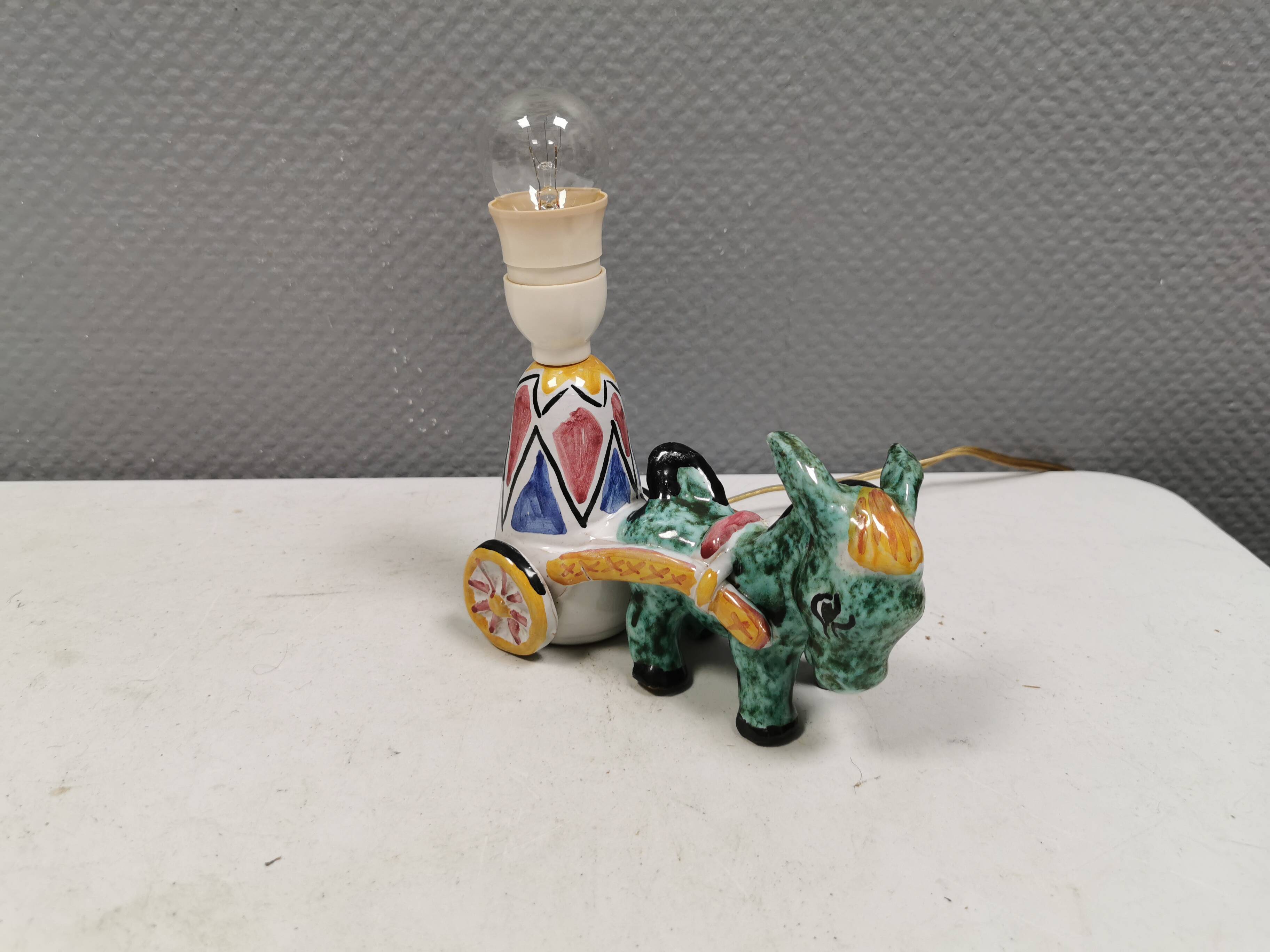 Unique "donkey" table lamp in ceramic with a harlequin pattern, Italy 1970s