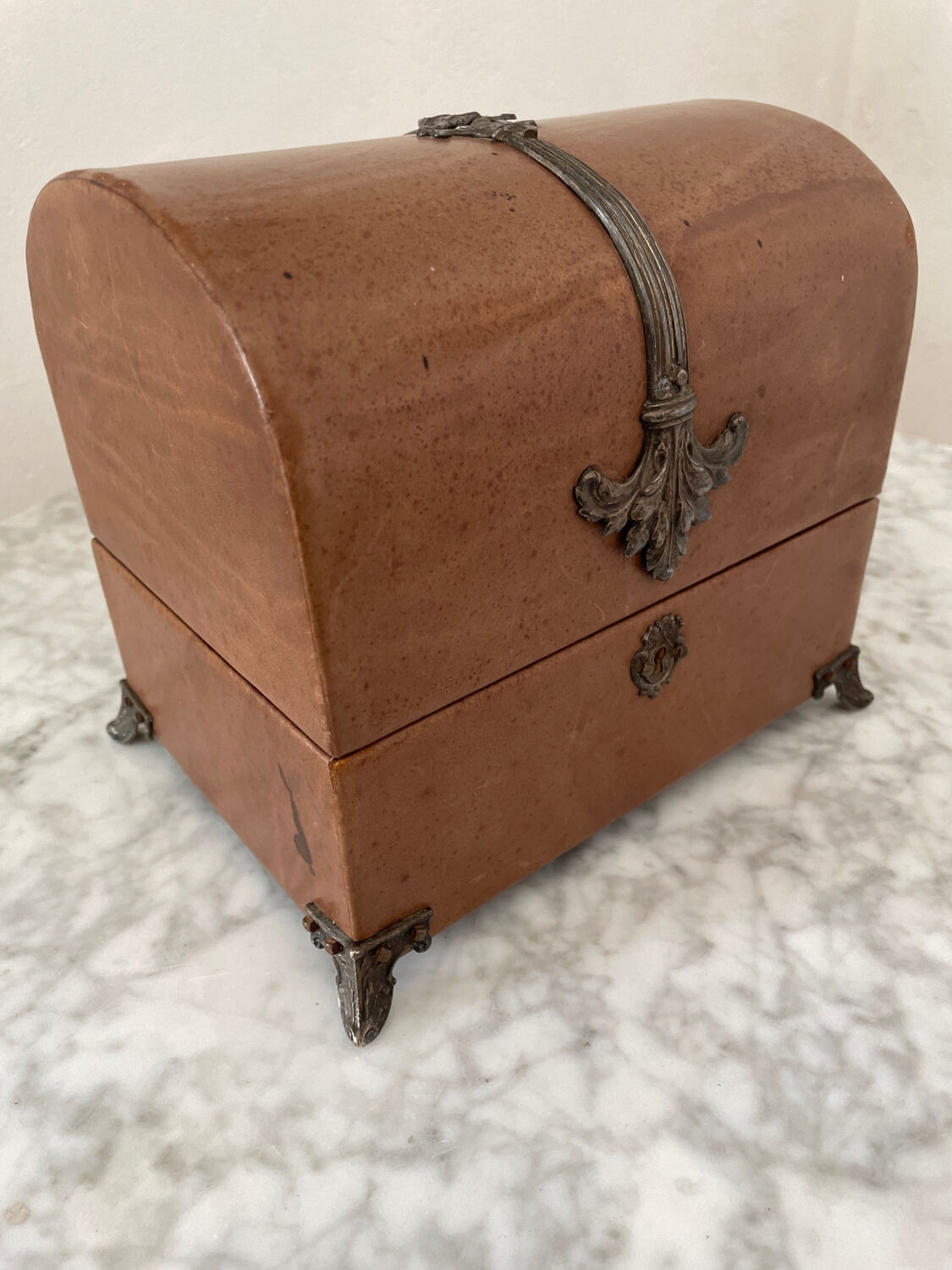 Vintage leather and silver metal jewelry box.