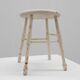 Rustic white wooden low farm stool, France ca. 1920