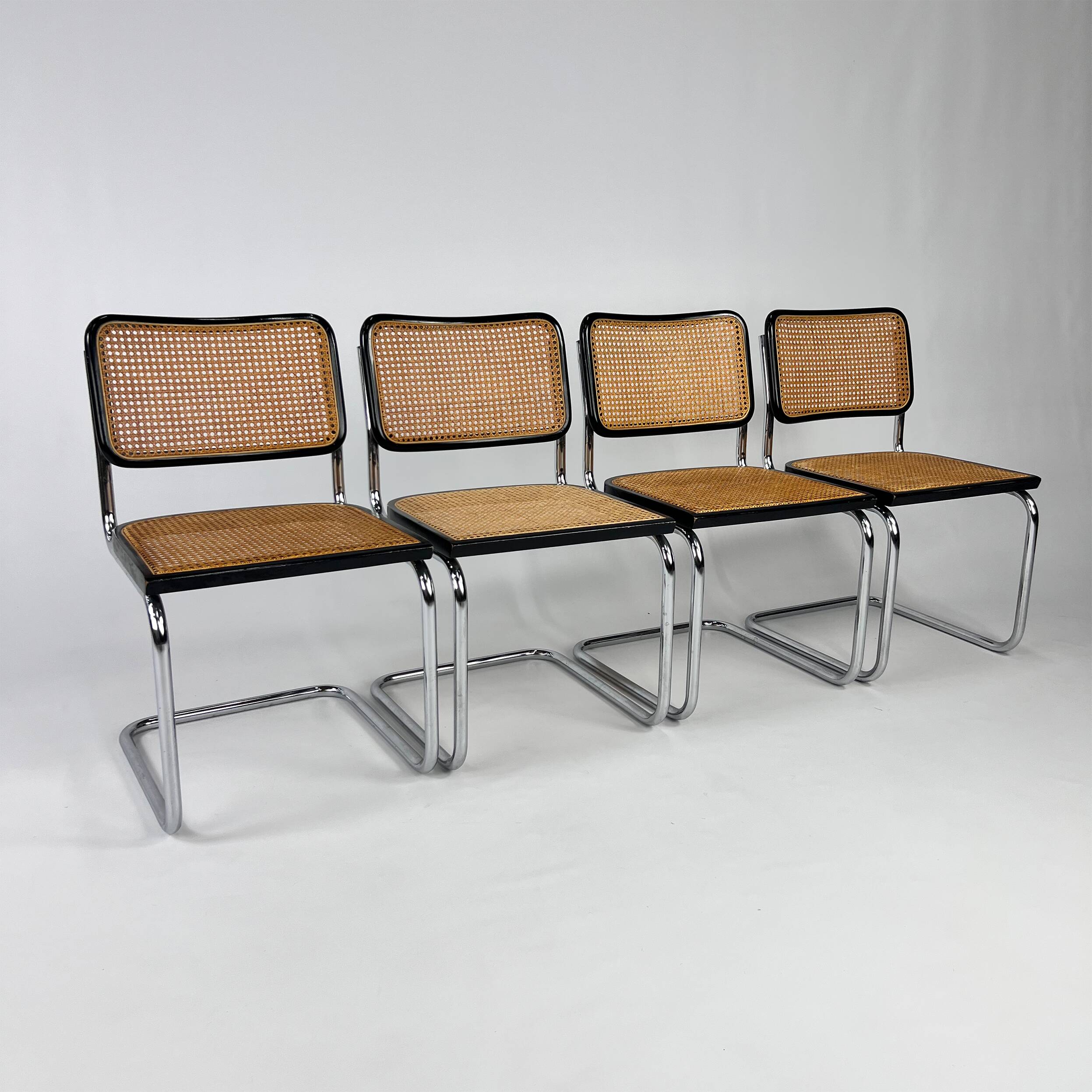 Set of 4 Tubular Frame and Cane Cantilever dining chairs, Italy, 1970s