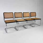 Set of 4 Tubular Frame and Cane Cantilever dining chairs, Italy, 1970s