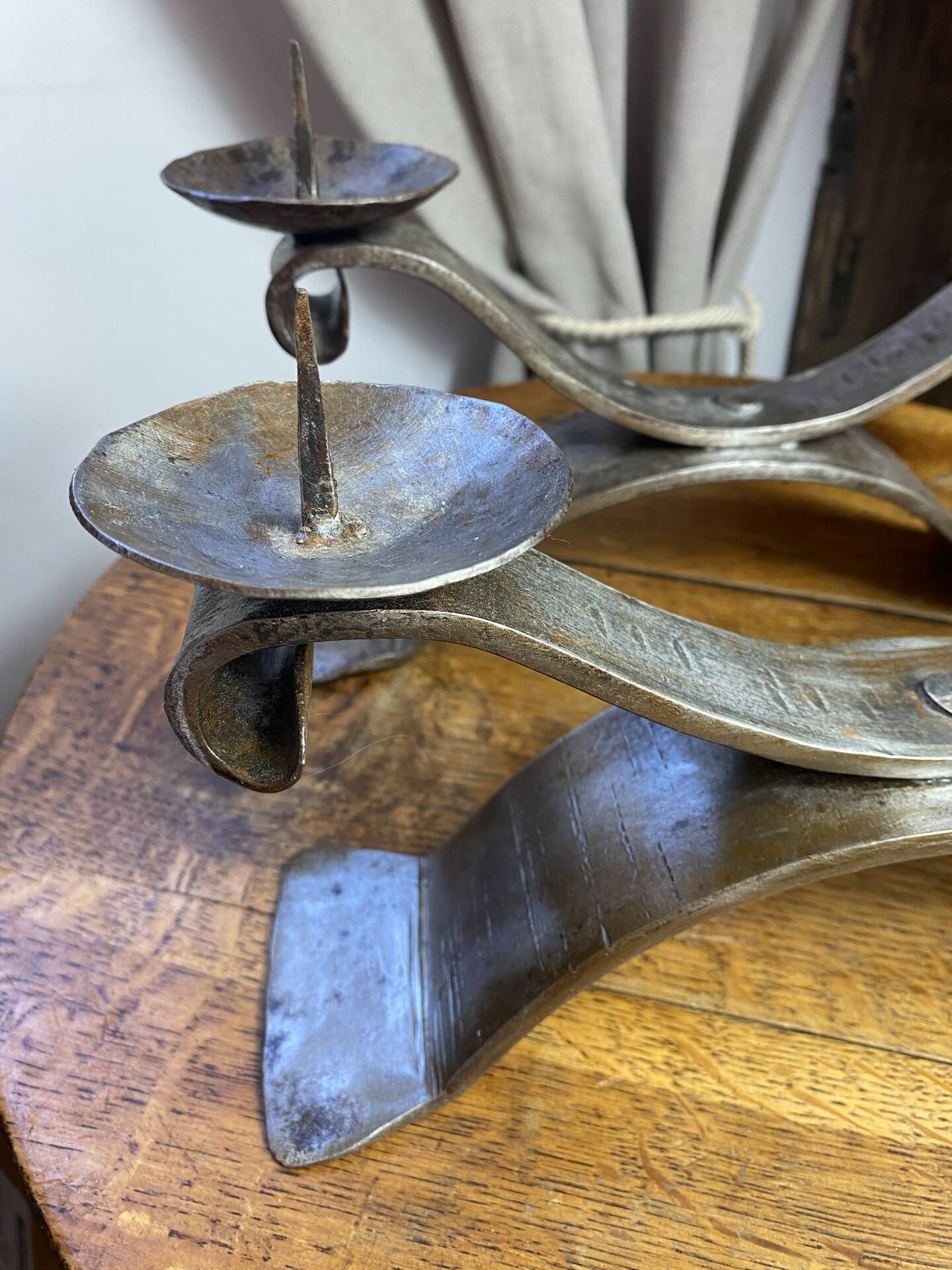 Brutalist wrought iron candlestick pair