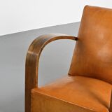 Art Deco club armchair in Havana leather, around 1940.