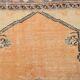 Tapis oriental vintage fait main orange pastel