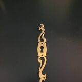 Patinated brass keyholes
