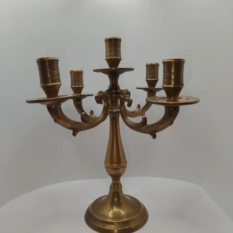 Vintage brass chandelier candelabra with 4 pivoting branches in classic style.