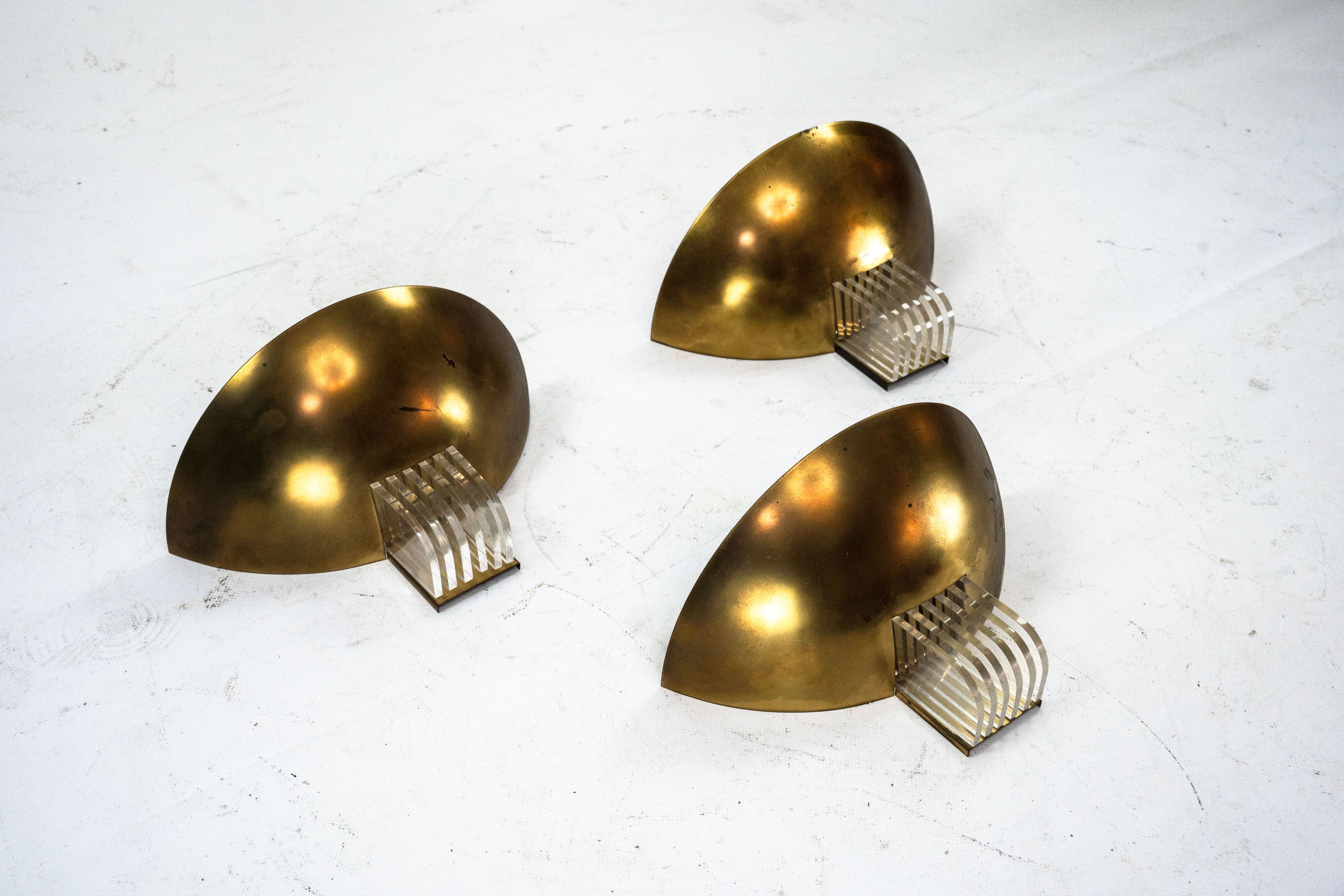 Set of three Italian Deco-style brass wall sconces, Italy 1970s
