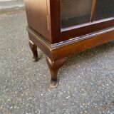 English display case with 2 wooden bodies