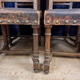 Set of 8 Renaissance style chairs in walnut and embossed leather
