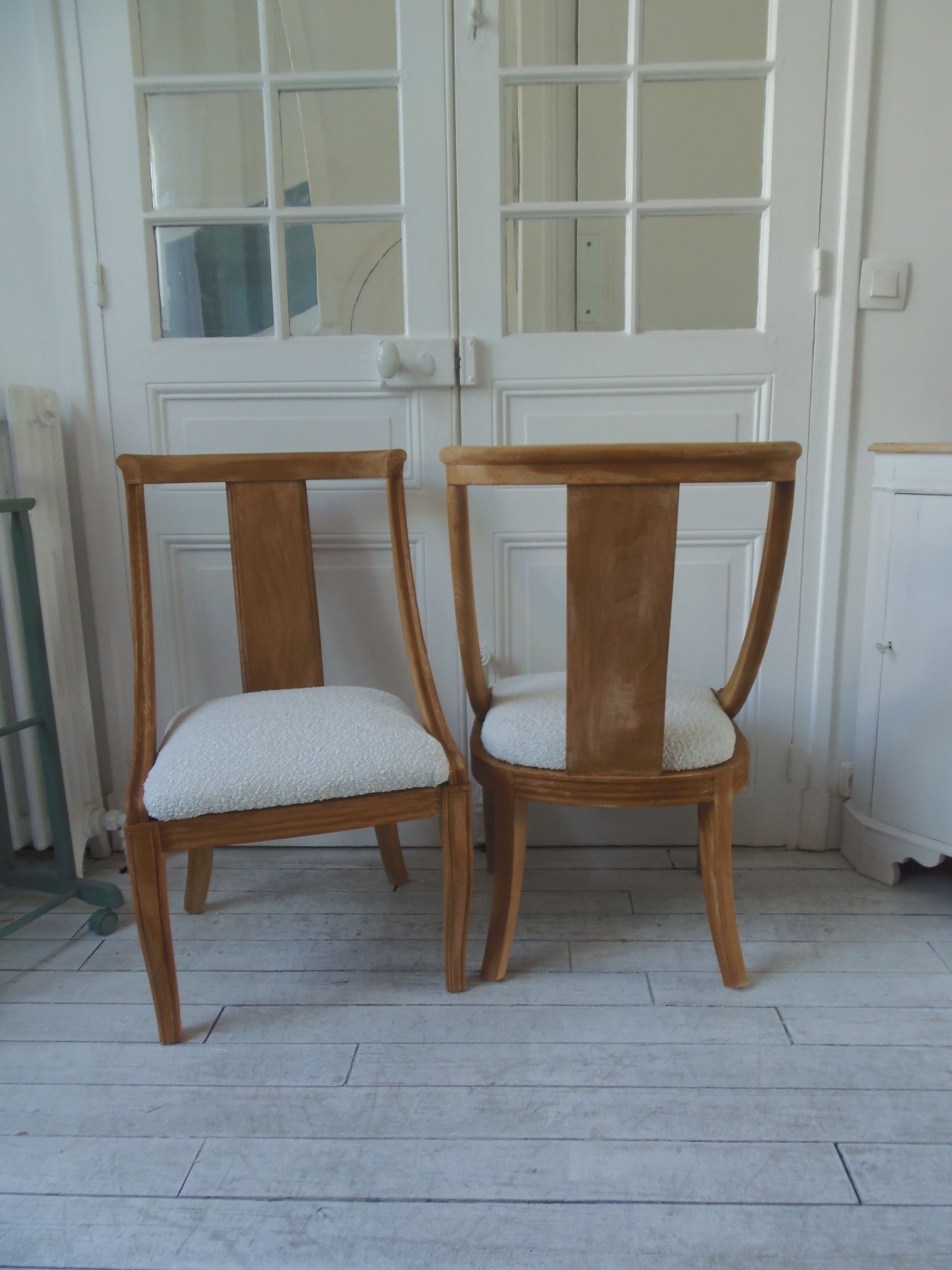 Pair of Gondola heaters, upholstered with a cream curl fabric