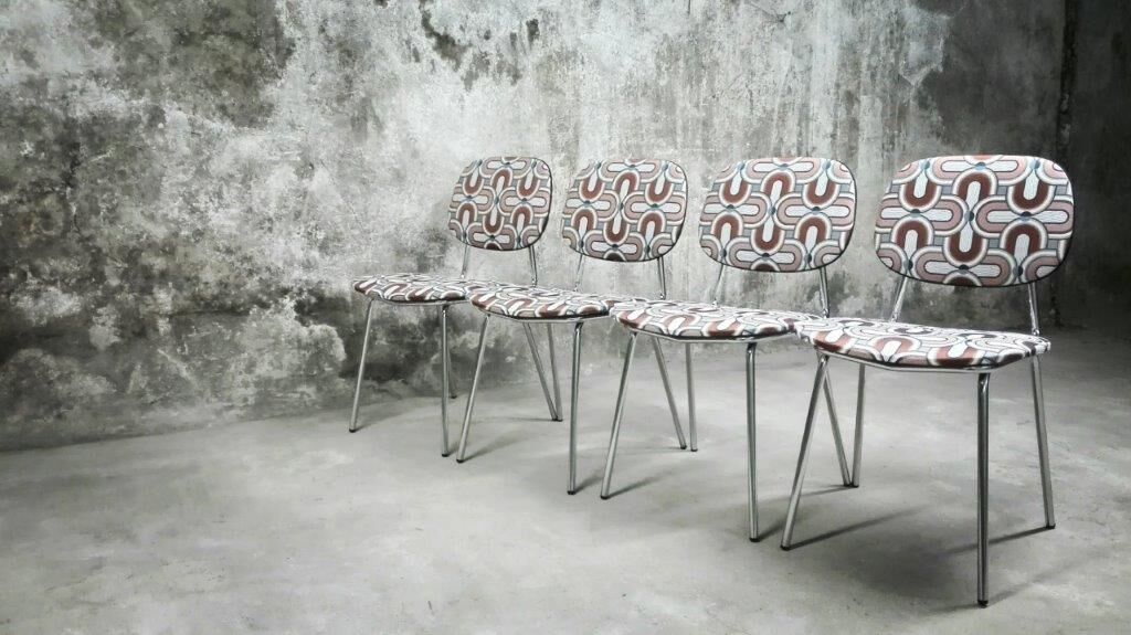Series of four vintage italian chairs in chrome steel