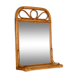 Arched rattan mirror with shelf. 1960.