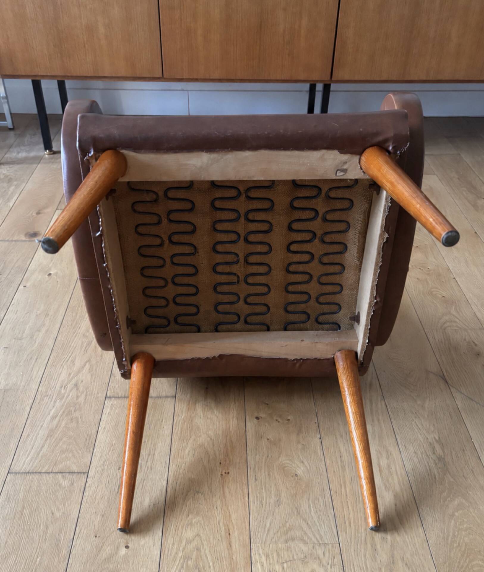Modernist armchair with oval armrests, 1950s-1960s