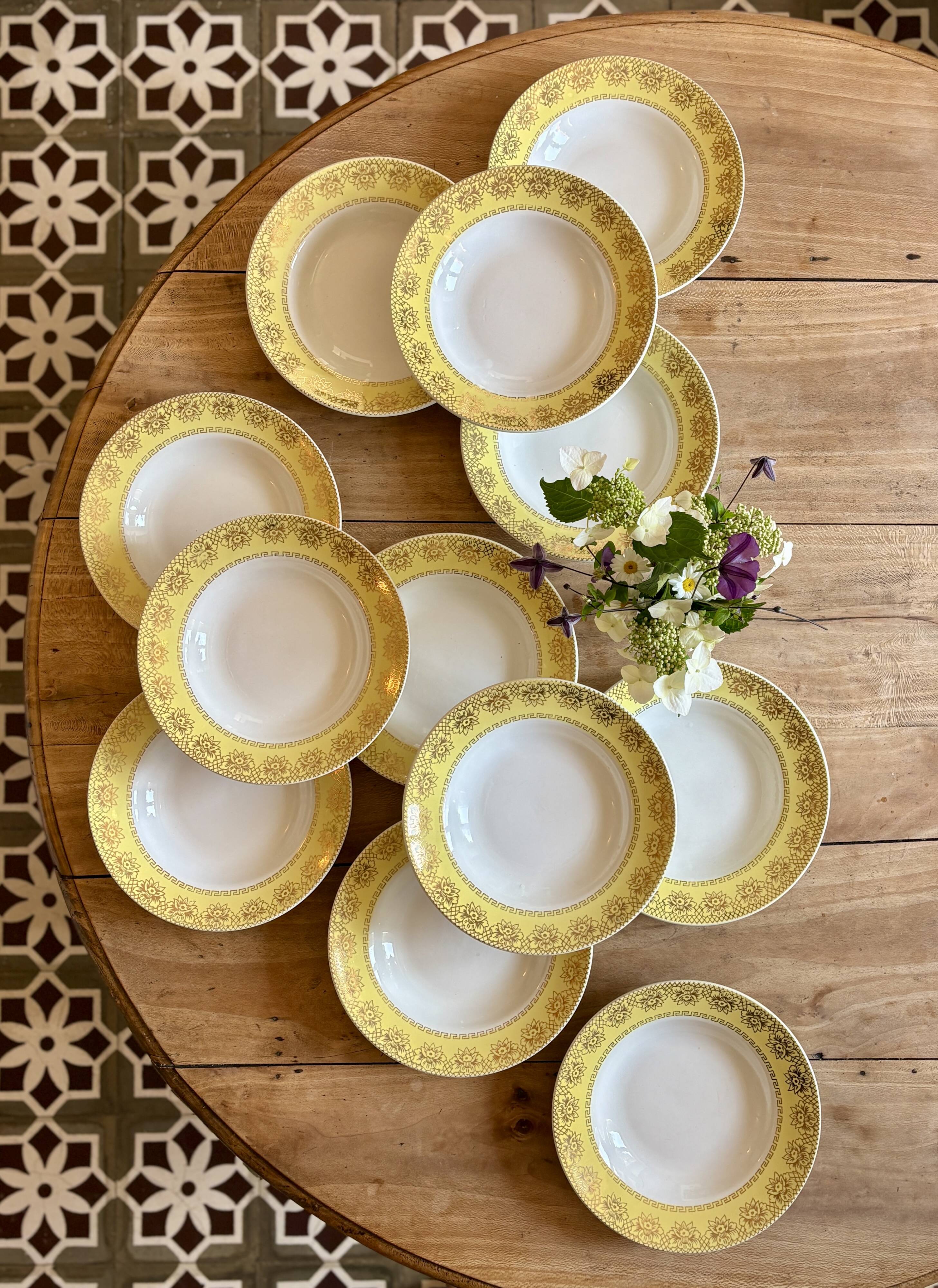 Set of 12 vintage yellow, white and gold soup plates