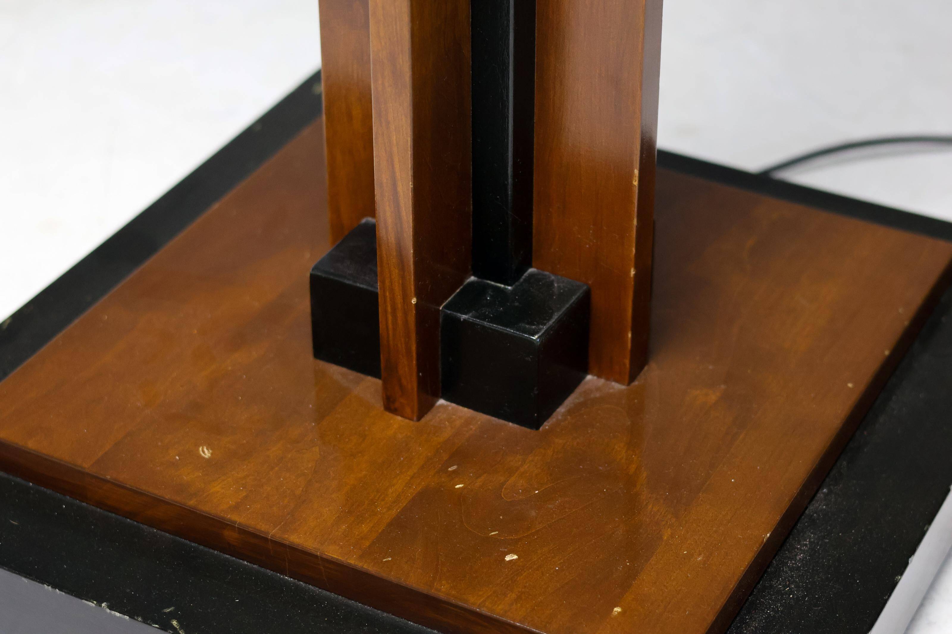 Amsterdam School floor lamp in partially ebonised cherry with a black linen shade.