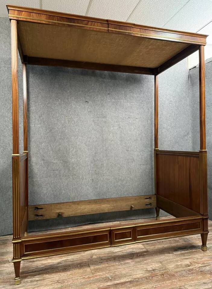 Parisian Louis XVI style four-poster bed in mahogany and gilded bronze circa 1850