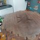 Vintage tripod stool in carved solid wood.