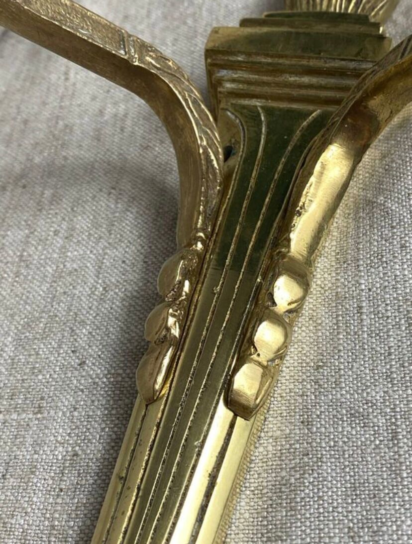 Pair of wall candle holders in bronze